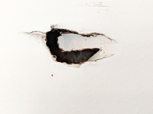 hole in the wall that need to be repaired in a home